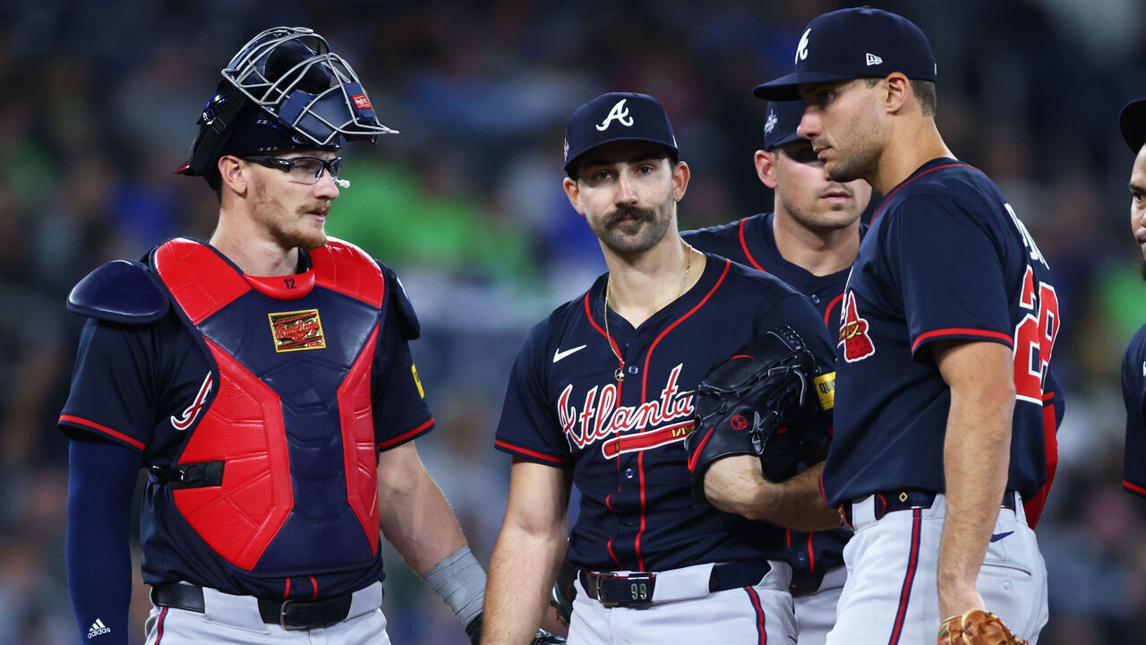 TORONTO, CANADA - APRIL 16: Spencer Strider #99 of the Atlanta Braves has a meeting on the mound alongside Sean Murphy #12, Matt Olson #28, and Ozzie Albies #1, before leaving the game in the sixth inning of their MLB game against the Toronto Blue Jays at Rogers Centre on April 16, 2025 in Toronto, Ontario, Canada.
