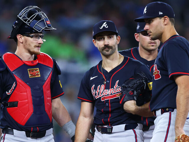 TORONTO, CANADA - APRIL 16: Spencer Strider #99 of the Atlanta Braves has a meeting on the mound alongside Sean Murphy #12, Matt Olson #28, and Ozzie Albies #1, before leaving the game in the sixth inning of their MLB game against the Toronto Blue Jays at Rogers Centre on April 16, 2025 in Toronto, Ontario, Canada.