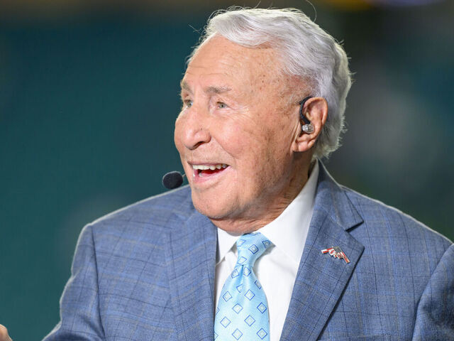 MIAMI GARDENS, FL - JANUARY 09: ESPN college football analyst Lee Corso smiles on the ESPN College Gameday set before the Penn State Nittany Lions versus Notre Dame Fighting Irish College Football Playoff Semifinal at the Capital One Orange Bowl on January 9, 2025, at Hard Rock Stadium in Miami Gardens, FL.