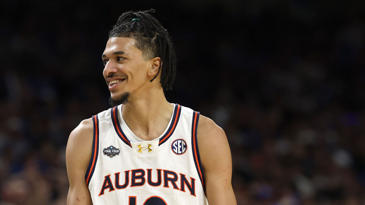 SAN ANTONIO, TEXAS - APRIL 05: Chad Baker-Mazara #10 of the Auburn Tigers reacts during the second half in the Final Four game of the NCAA Men's Basketball Tournament against the Florida Gators at the Alamodome on April 05, 2025 in San Antonio, Texas.