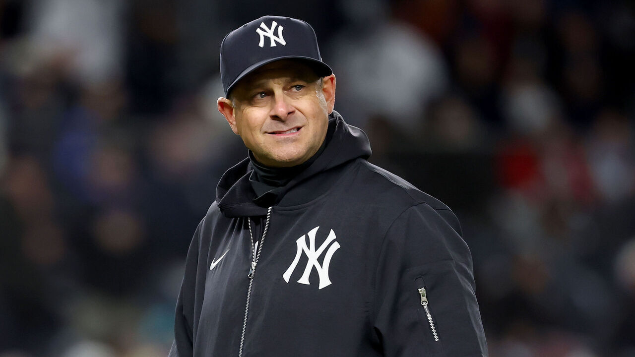 NEW YORK, NEW YORK - APRIL 01: Aaron Boone #17 of the New York Yankees walks back to the dugout after a pitching change in the eighth inning against the Arizona Diamondbacks at Yankee Stadium on April 01, 2025 in the Bronx borough of New York City.