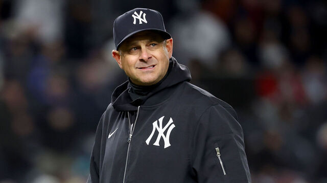 NEW YORK, NEW YORK - APRIL 01: Aaron Boone #17 of the New York Yankees walks back to the dugout after a pitching change in the eighth inning against the Arizona Diamondbacks at Yankee Stadium on April 01, 2025 in the Bronx borough of New York City.