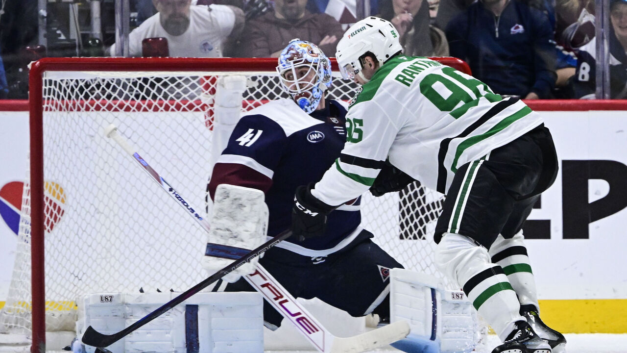 DENVER, CO - MARCH 16: Colorado Avalanche goaltender Scott Wedgewood (41) blocks a shot by Dallas Stars right wing Mikko Rantanen (96) in the third period at Ball Arena in Denver, Colorado on Sunday, March 16, 2025.