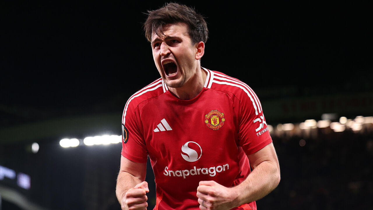 MANCHESTER, ENGLAND - APRIL 17: Harry Maguire of Manchester United celebrates after scoring a goal to make it 5-4 during the UEFA Europa League 2024/25 Quarter Final Second Leg match between Manchester United and Olympique Lyonnais at Old Trafford on April 17, 2025 in Manchester, England.