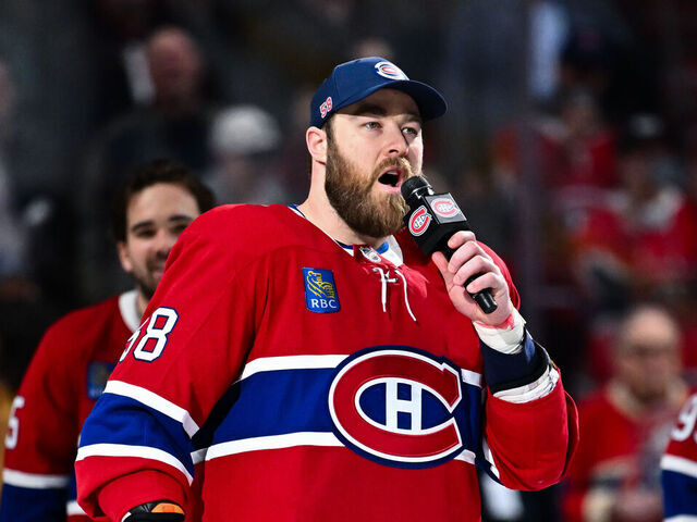MONTREAL, CANADA - APRIL 16: David Savard #58 of the Montreal Canadiens addresses the fans after a 4-2 victory against the Carolina Hurricanes clinching the last spot in the Eastern Conference playoffs at the Bell Centre on April 16, 2025 in Montreal, Quebec, Canada.