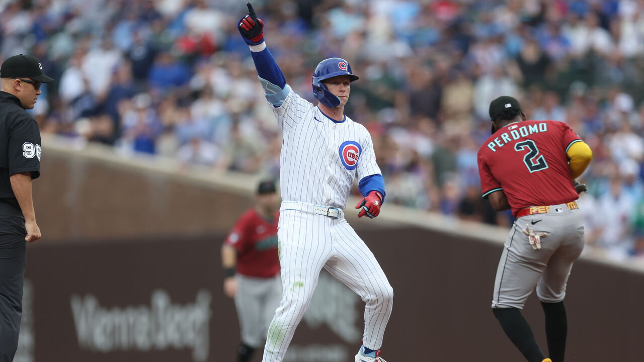 CHICAGO, ILLINOIS - APRIL 18: Pete Crow-Armstrong #4 of the Chicago Cubs celebrates hitting a double during the second inning against the Arizona Diamondbacks at Wrigley Field on April 18, 2025 in Chicago, Illinois.