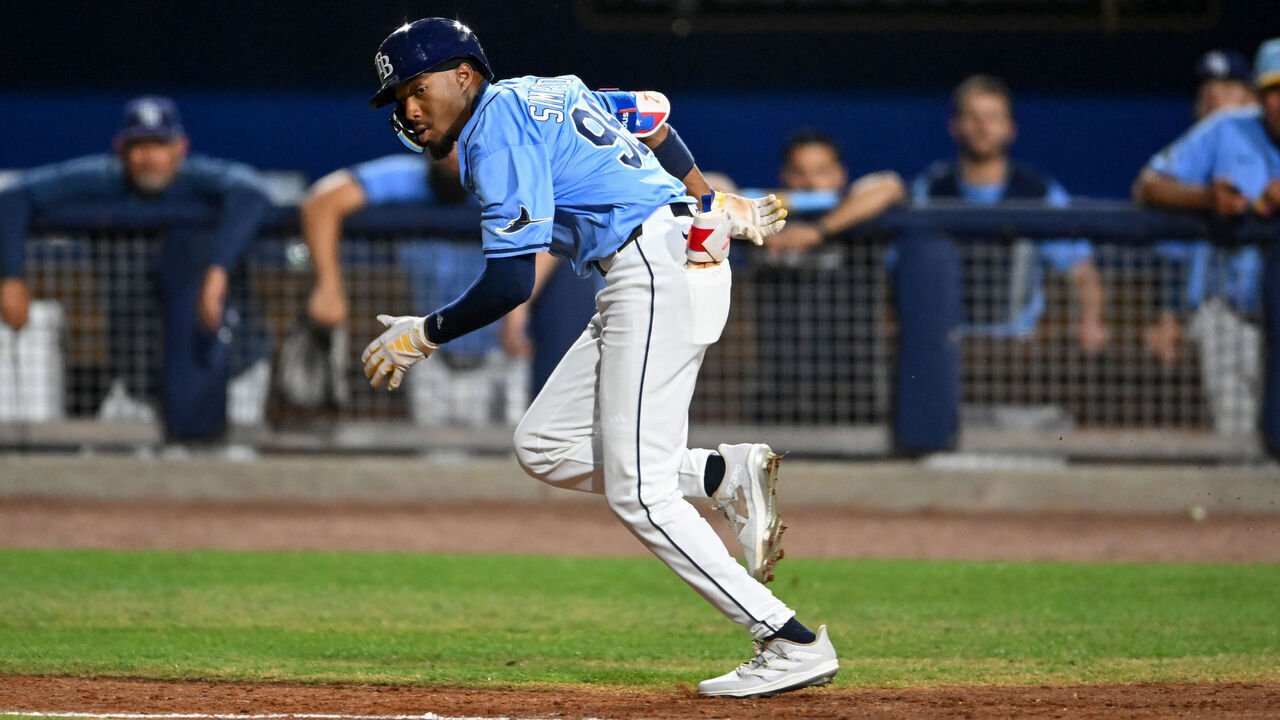 PORT CHARLOTTE, FLORIDA - MARCH 13, 2025: Chandler Simpson #96 of the Tampa Bay Rays runs out a bunt single during the third inning of a spring training Spring Breakout game against the Boston Red Sox at Charlotte Sports Complex on March 13, 2025 in Port Charlotte, Florida.