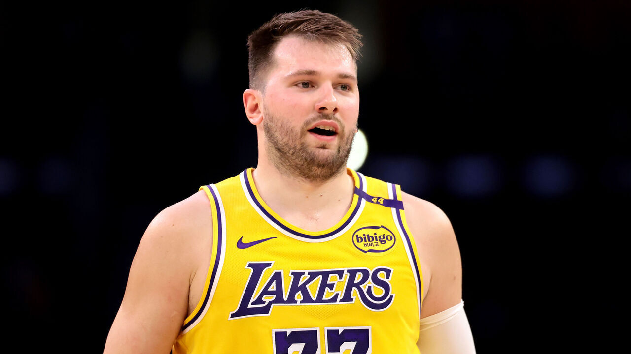 LOS ANGELES, CALIFORNIA - APRIL 11: Luka Doncic #77 of the Los Angeles Lakers reacts to a basket during the first quarter against the Houston Rockets at Crypto.com Arena on April 11, 2025 in Los Angeles, California.