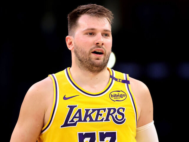 LOS ANGELES, CALIFORNIA - APRIL 11: Luka Doncic #77 of the Los Angeles Lakers reacts to a basket during the first quarter against the Houston Rockets at Crypto.com Arena on April 11, 2025 in Los Angeles, California.
