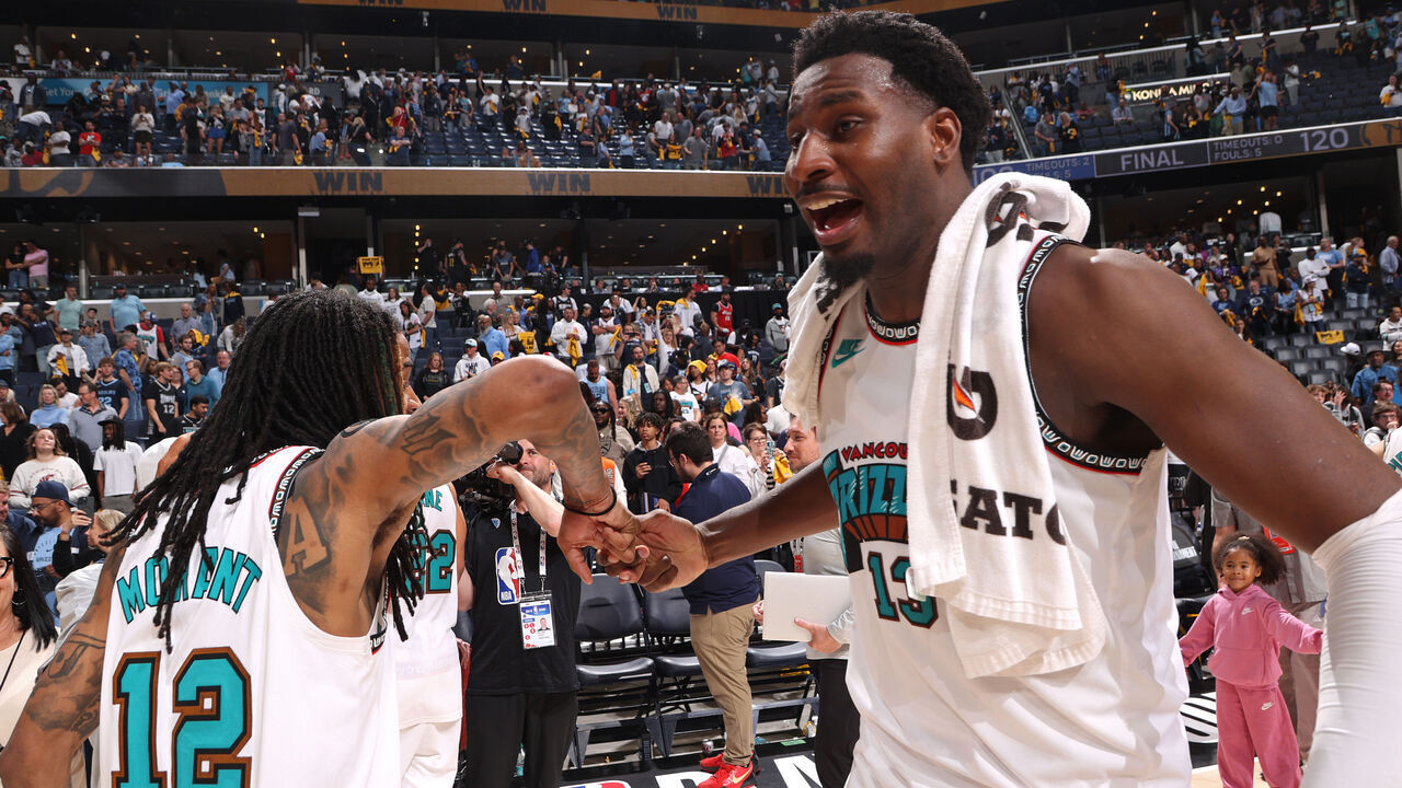 MEMPHIS, TN - APRIL 18: Jaren Jackson Jr. #13 and Ja Morant #12 of the Memphis Grizzlies celebrate after the game against the Dallas Mavericks during the 2025 SoFi Play-In Tournament on April 18, 2025 at FedExForum in Memphis, Tennessee. Mandatory Copyright Notice: Copyright 2025 NBAE