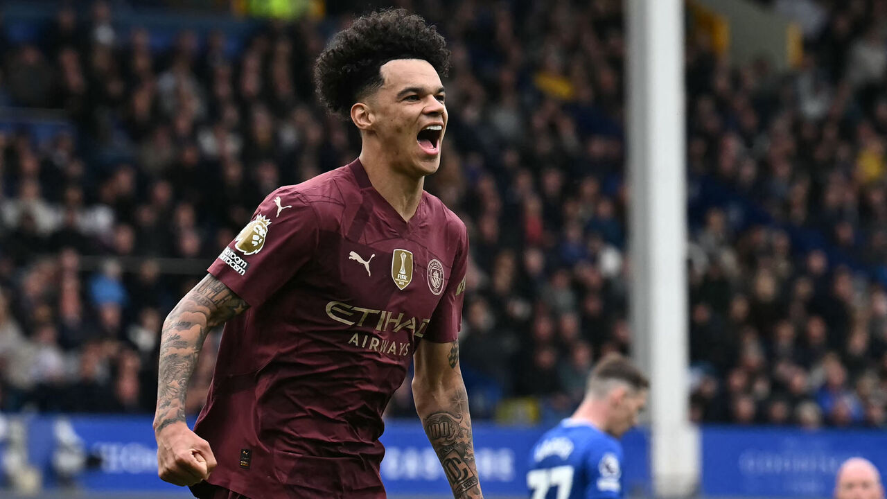 Manchester City's English midfielder #75 Nico O'Reilly celebrates after scoring the opening goal during the English Premier League football match between Everton and Manchester City at Goodison Park in Liverpool, north west England on April 19, 2025.