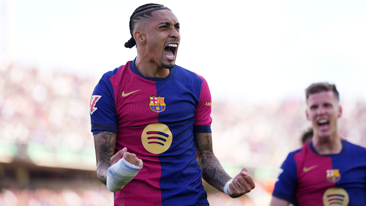 BARCELONA, SPAIN - APRIL 19: Raphinha of FC Barcelona celebrates scoring his team's fourth goal which was taken from the penalty spot during the La Liga match between FC Barcelona and RC Celta de Vigo at Estadi Olimpic Lluis Companys on April 19, 2025 in Barcelona, Spain.