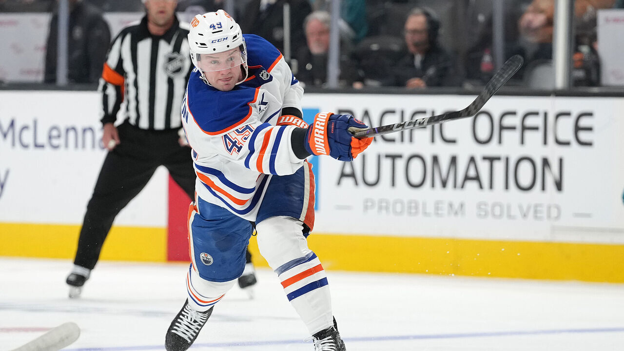 SAN JOSE, CALIFORNIA - APRIL 16: Ty Emberson #49 of the Edmonton Oilers shoots on goal and scores against the San Jose Sharks in the first period at SAP Center on April 16, 2025 in San Jose, California.