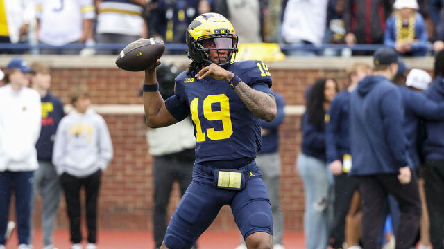 ANN ARBOR, MICHIGAN - APRIL 19: Bryce Underwood #19 of the Michigan Wolverines warms up before the Maize vs Blue spring football game at Michigan Stadium on April 19, 2025 in Ann Arbor, Michigan.
