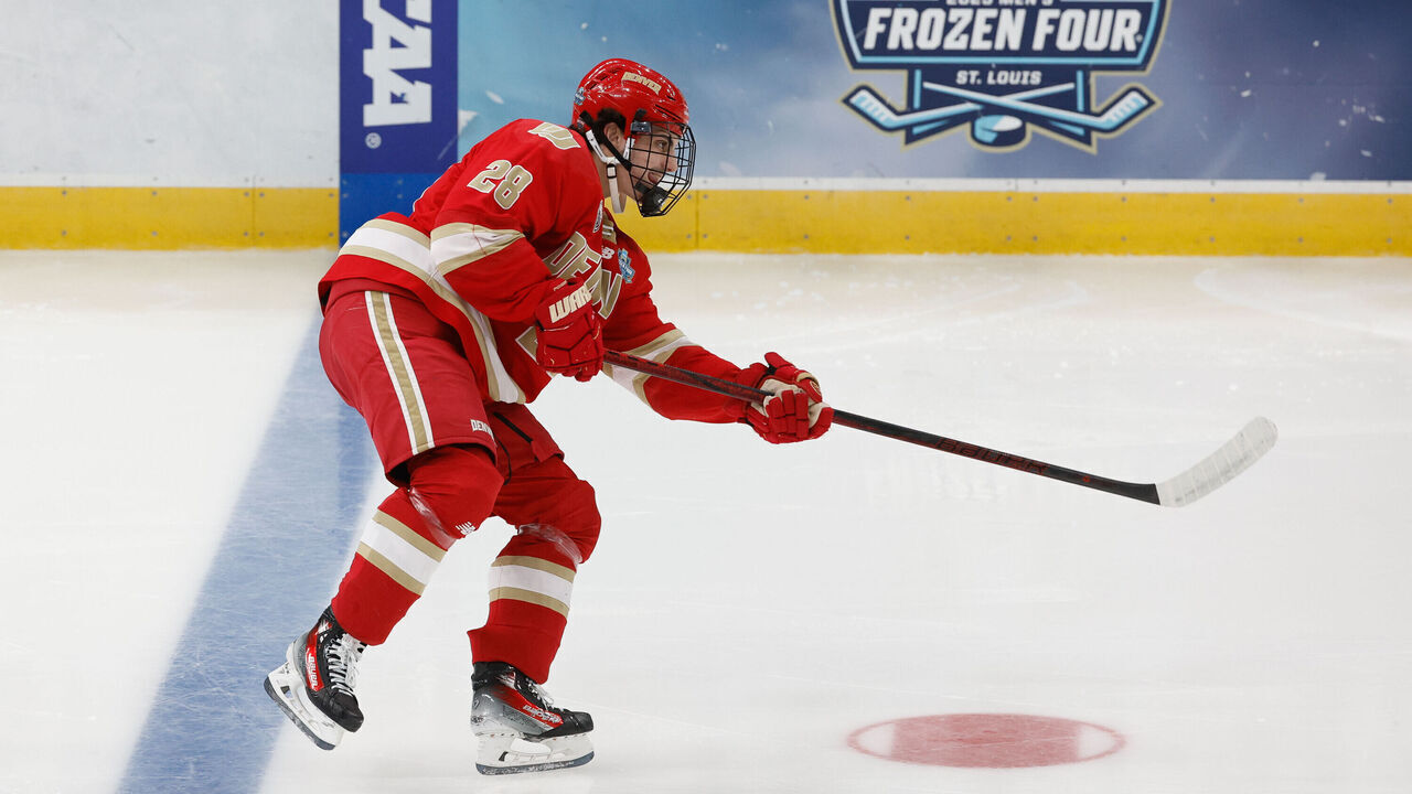 ST. LOUIS, MISSOURI - APRIL 10: Zeev Buium #28 of the Denver Pioneers shoots the puck against the Western Michigan Broncos in the second period during the NCAA Men's Hockey Frozen Four semifinal at the Enterprise Center on April 10, 2025 in St. Louis, Missouri. The Broncos won 3-2 in double overtime.