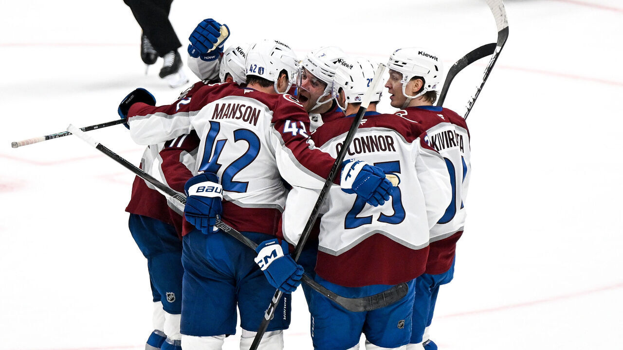 DALLAS, TEXAS - APRIL 19: Nathan MacKinnon #29 of the Colorado Avalanche celebrates with teammates after scoring a goal in the third period against the Dallas Stars of Game One of the First Round of the 2025 Stanley Cup Playoffs at American Airlines Center on April 19, 2025 in Dallas, Texas.