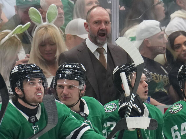 DALLAS, TX - APRIL 19: Pete DeBoer watches the action from behind the bench against the Colorado Avalanche in the second period of Game One of the First Round of the 2025 Stanley Cup Playoffs at the American Airlines Center on April 19, 2025 in Dallas, Texas.