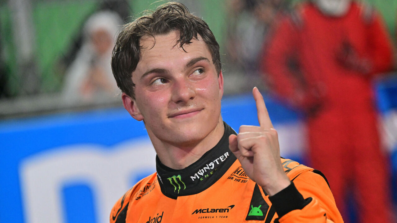 TOPSHOT - McLaren's Australian driver Oscar Piastri celebrates winning the 2025 Saudi Arabia Formula One Grand Prix at the Jeddah Corniche Circuit on April 20, 2025.