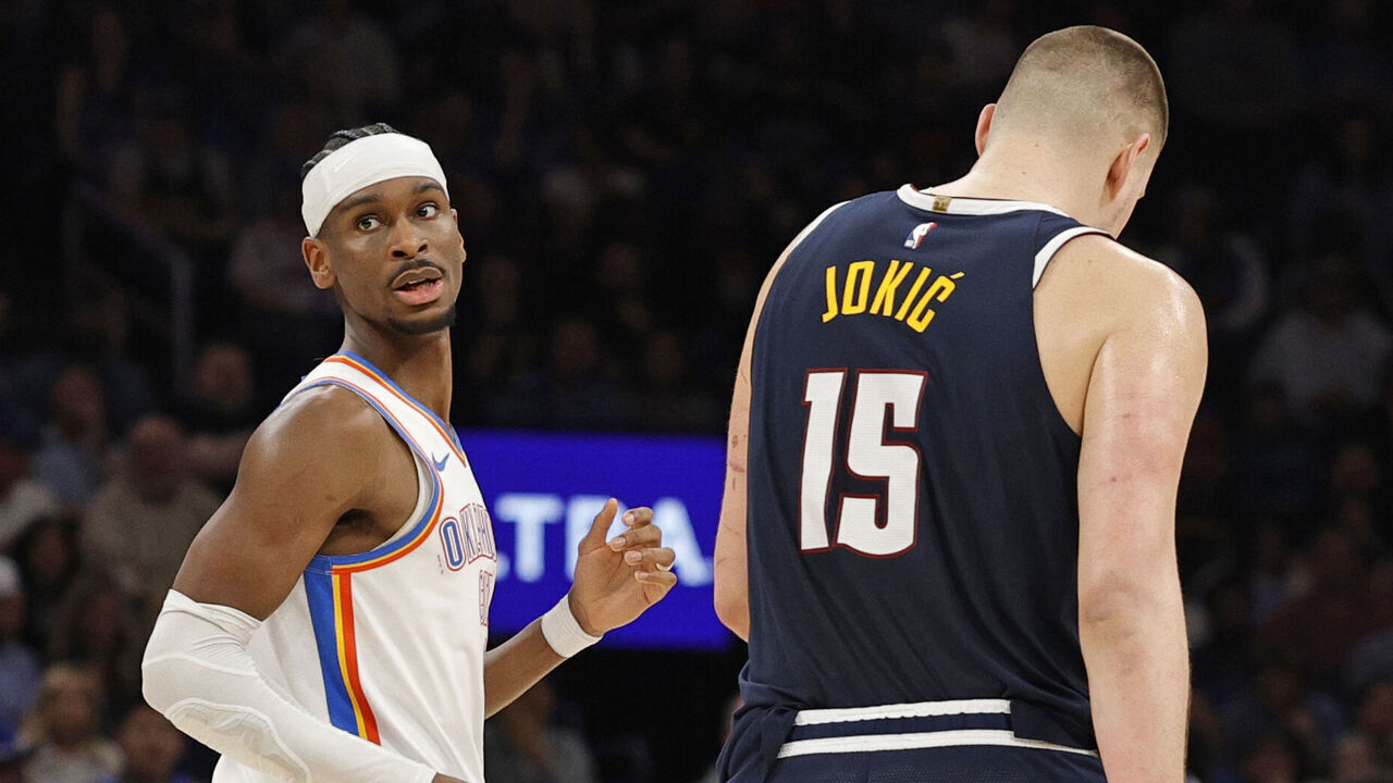 OKLAHOMA CITY, OK - MARCH 10: Shai Gilgeous-Alexander #2 of the Oklahoma City Thunder and Nikola Jokic #15 of the Denver Nuggets look on during the game on March 10, 2025 at Paycom Center in Oklahoma City, Oklahoma. Mandatory Copyright Notice: Copyright 2025 NBAE
