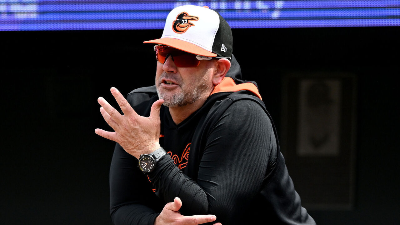 BALTIMORE, MARYLAND - APRIL 20: Manager Brandon Hyde #18 of the Baltimore Orioles watches the game in the second inning against the Cincinnati Reds at Oriole Park at Camden Yards on April 20, 2025 in Baltimore, Maryland.