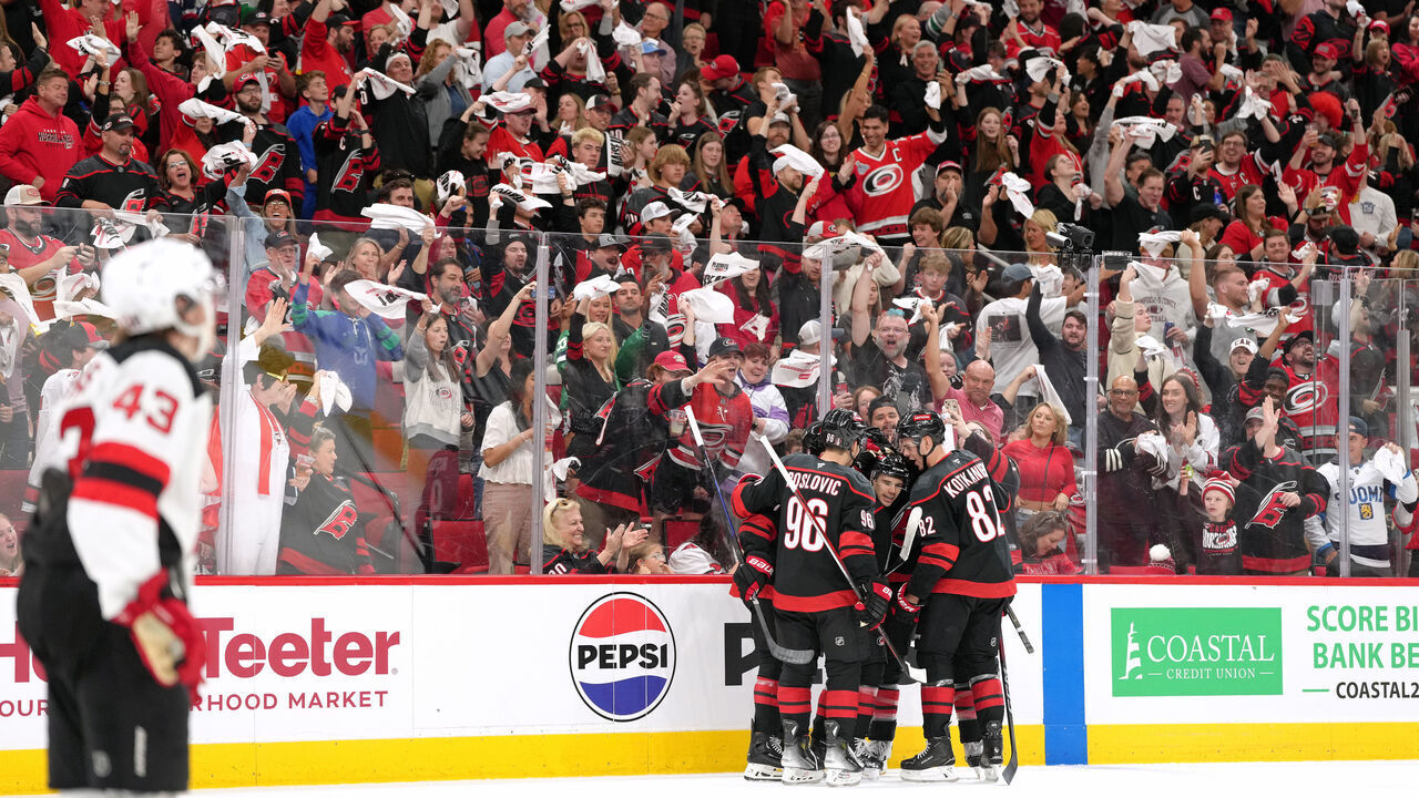 RALEIGH, NORTH CAROLINA - APRIL 20: Logan Stankoven #22 of the Carolina Hurricanes celebrates after scoring a goal against the New Jersey Devils in the second period of Game One of the First Round of the 2025 Stanley Cup Playoffs at Lenovo Center on April 20, 2025 in Raleigh, North Carolina.