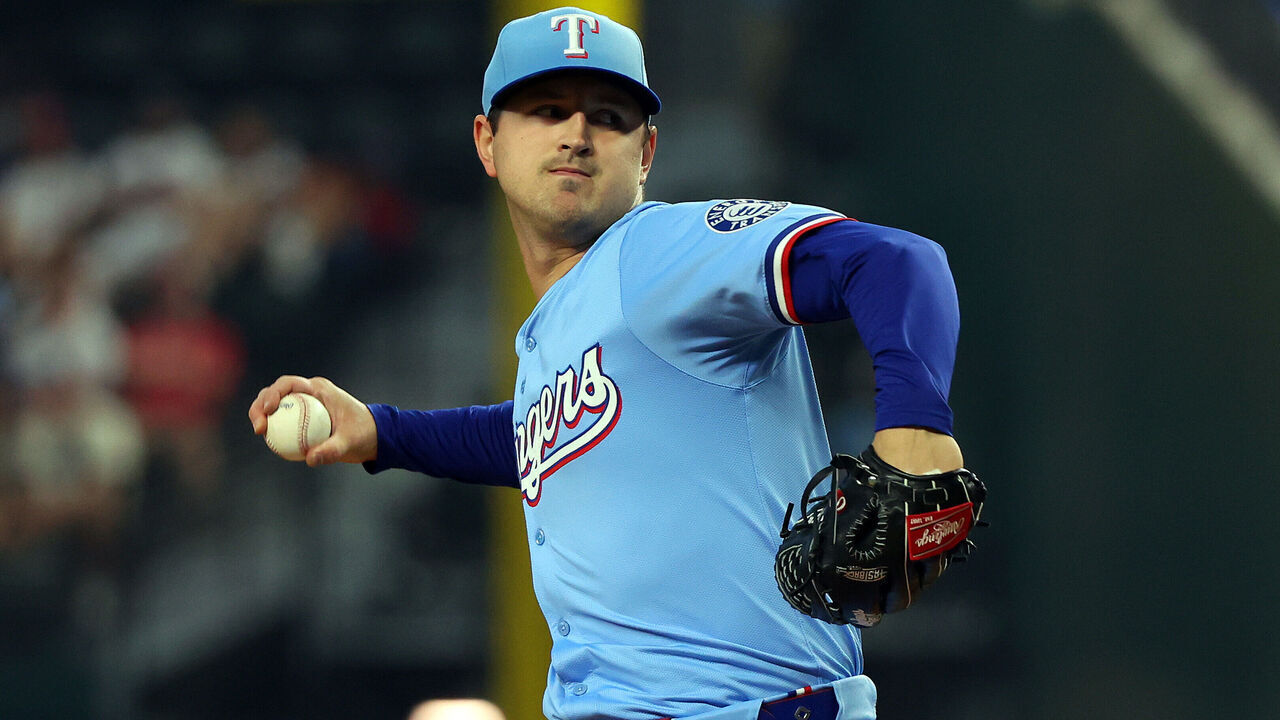 ARLINGTON, TEXAS - APRIL 20: Tyler Mahle #51 of the Texas Rangers pitches in the first inning against the Los Angeles Dodgers at Globe Life Field on April 20, 2025 in Arlington, Texas.