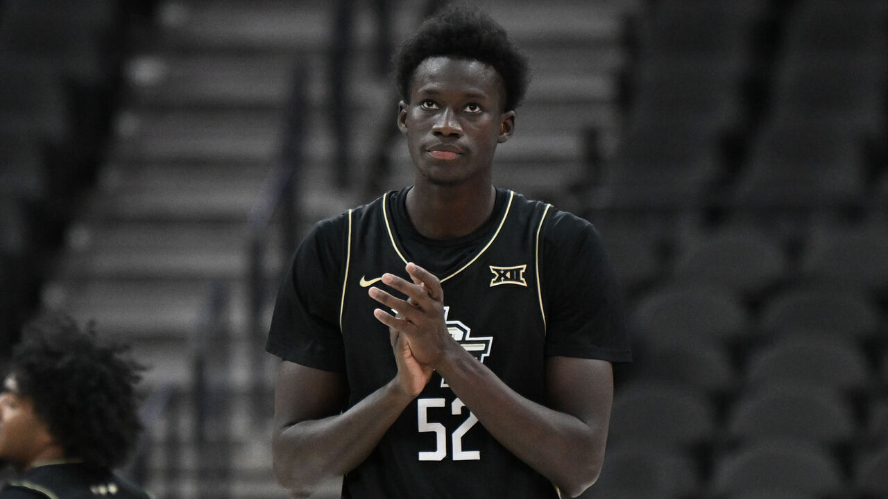 LAS VEGAS, NEVADA - APRIL 05: Moustapha Thiam #52 of the UCF Knights reacts to a play against the Villanova Wildcats in the second half in a semifinal game of the College Basketball Crown tournament at T-Mobile Arena on April 05, 2025 in Las Vegas, Nevada. The Knights defeated the Wildcats 104-98 in overtime.