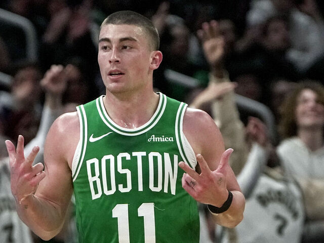 Boston, MA - April 4: Boston Celtics PG Payton Pritchard celebrates hitting a 3-pointer in the second quarter.