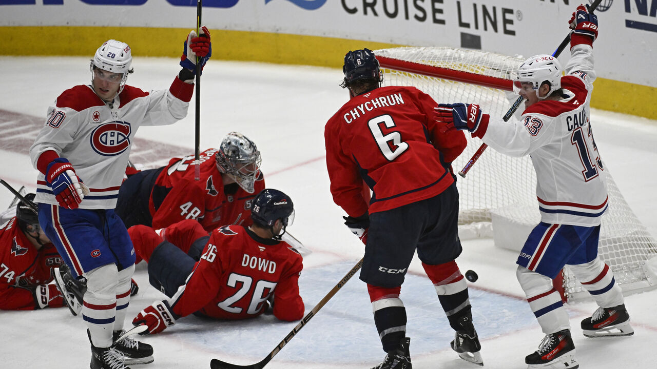 WASHINGTON, DC - APRIL 21: The Montreal Canadiens celebrate the game tying goal past Washington Capitals goaltender Logan Thompson (48) during the third period of game one of a first round playoff hockey game at Capital One Arena in Washington, DC on April 21, 2025.