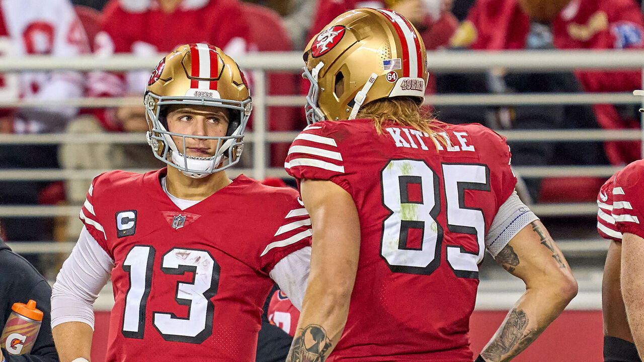 SANTA CLARA, CALIFORNIA - DECEMBER 25: Brock Purdy #13 talks to George Kittle #85 of the San Francisco 49ers in action during a game between the San Francisco 49ers and the Baltimore Ravens at Levi's Stadium on December 25, 2023 in Santa Clara, California.