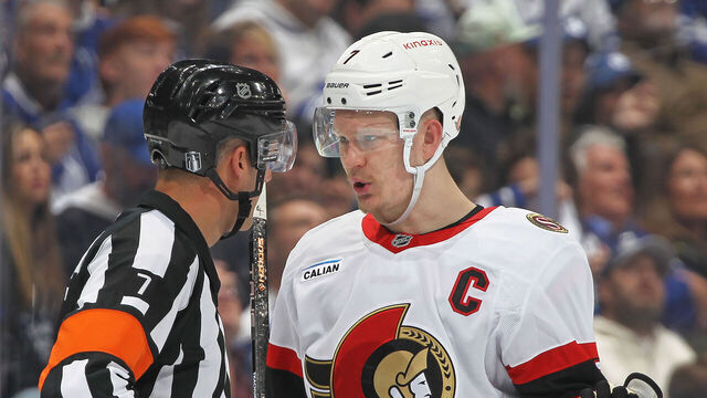 TORONTO, CANADA - APRIL 20: Brady Tkachuk #7 of the Ottawa Senators questions a call by referee Garrett Rank #7 during action against the Toronto Maple Leafs during the second period in Game One of the First Round of the 2025 Stanley Cup Playoffs at Scotiabank Arena on April 20, 2025 in Toronto, Ontario, Canada.