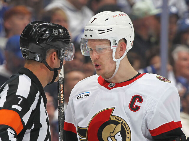 TORONTO, CANADA - APRIL 20: Brady Tkachuk #7 of the Ottawa Senators questions a call by referee Garrett Rank #7 during action against the Toronto Maple Leafs during the second period in Game One of the First Round of the 2025 Stanley Cup Playoffs at Scotiabank Arena on April 20, 2025 in Toronto, Ontario, Canada.