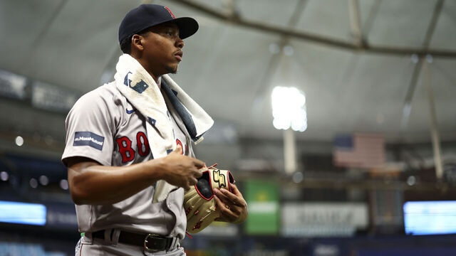 TAMPA, FL - SEPTEMBER 19: Brayan Bello #66 of the Boston Red Sox walks to the dugout prior to the game between the Boston Red Sox and the Tampa Bay Rays at Tropicana Field on Thursday, September 19, 2024 in Tampa, Florida.