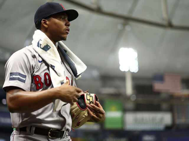 TAMPA, FL - SEPTEMBER 19: Brayan Bello #66 of the Boston Red Sox walks to the dugout prior to the game between the Boston Red Sox and the Tampa Bay Rays at Tropicana Field on Thursday, September 19, 2024 in Tampa, Florida.
