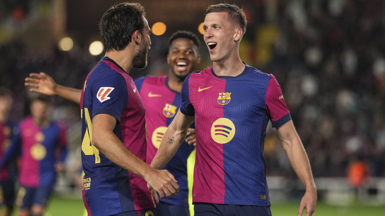 BARCELONA, SPAIN - APRIL 22: Dani Olmo of FC Barcelona celebrates with team mates after scoring the team's first goal during the La Liga EA Sports match between FC Barcelona and RCD Mallorca at Estadi Olimpic Lluis Companys on April 22, 2025 in Barcelona, Spain.