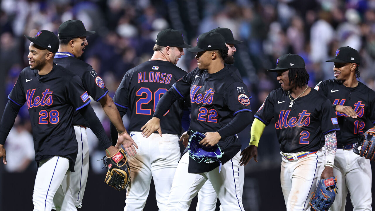NEW YORK, NEW YORK - APRIL 22: José Azocar #28, Juan Soto #22, and Luisangel Acuña #2 of the New York Mets celebrate after defeating the Philadelphia Phillies 5-1 in the game at Citi Field on April 22, 2025 in the Flushing neighborhood of the Queens borough of New York City.