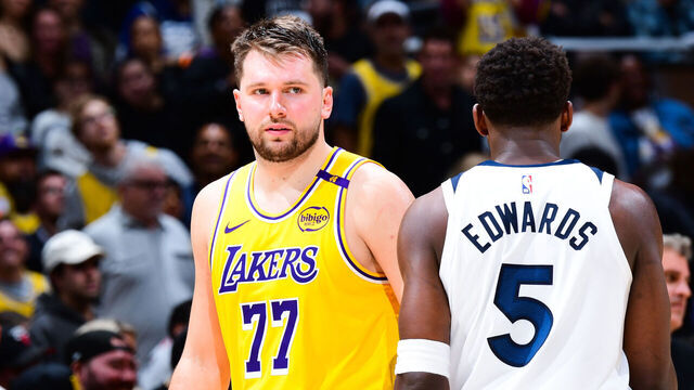 LOS ANGELES, CA - APRIL 22: Luka Doncic #77 of the Los Angeles Lakers and Anthony Edwards #5 of the Minnesota Timberwolves looks on during the game during Round 1 Game 2 of the 2025 NBA Playoffs on April 22, 2025 at Crypto.Com Arena in Los Angeles, California. NOTE TO USER: User expressly acknowledges and agrees that, by downloading and/or using this Photograph, user is consenting to the terms and conditions of the Getty Images License Agreement. Mandatory Copyright Notice: Copyright 2025 NBAE