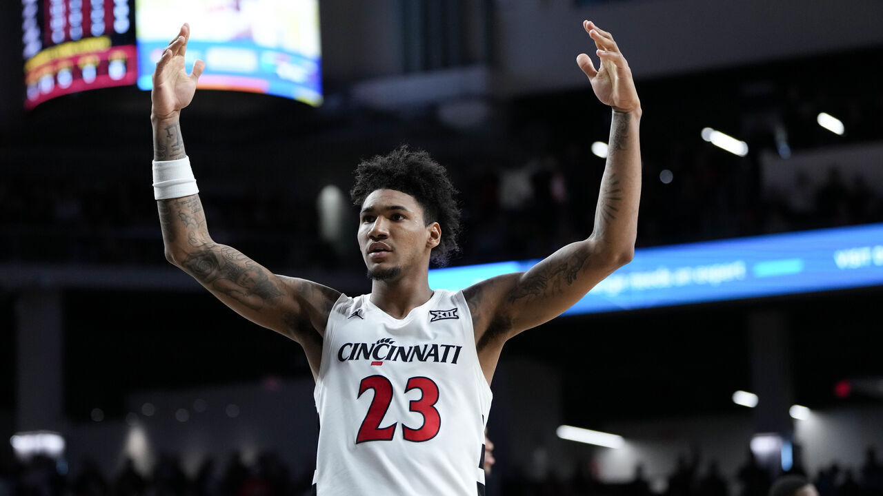 CINCINNATI, OHIO - FEBRUARY 25: Dillon Mitchell #23 of the Cincinnati Bearcats celebrates in the second half against the Baylor Bears at Fifth Third Arena on February 25, 2025 in Cincinnati, Ohio.