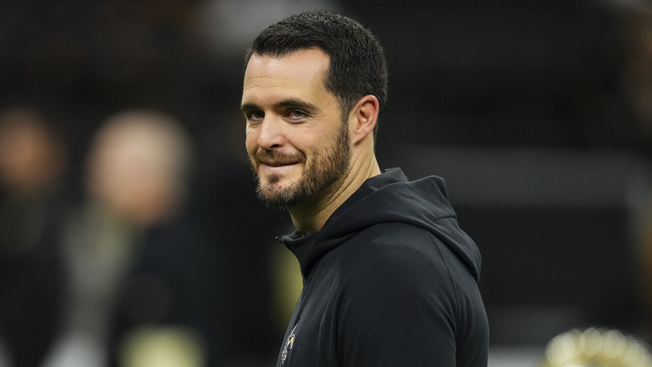 NEW ORLEANS, LA - DECEMBER 29: Derek Carr #4 of the New Orleans Saints looks on from the field during warmups prior to an NFL football game against the Las Vegas Raiders at Caesars Superdome on December 29, 2024 in New Orleans, Louisiana.