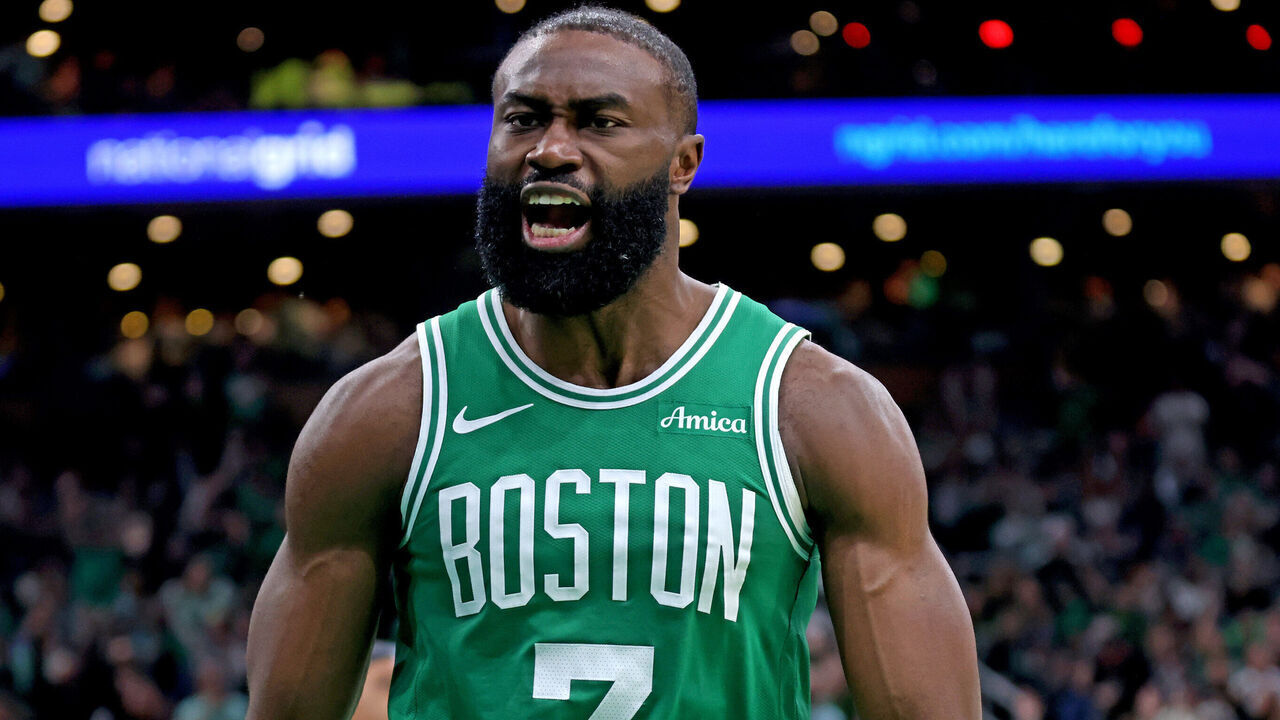 Boston, MA - April 23 - Jaylen Brown #7 of the Boston Celtics screams out after dunking against Paolo Banchero #5 of the Orlando Magic uring the third quarter of Game 2 of the Eastern Conference Finals at the TD Garden.