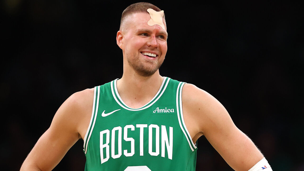 BOSTON, MASSACHUSETTS - APRIL 23: Kristaps Porzingis #8 of the Boston Celtics reacts with a bandage on his head against the Orlando Magic during the third quarter in Game Two of the Eastern Conference First Round NBA Playoffs at TD Garden on April 23, 2025 in Boston, Massachusetts.