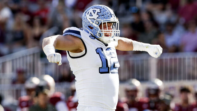 TALLAHASSEE, FL - NOVEMBER 02: Defensive End Beau Atkinson #12 of the North Carolina Tar Heels celebrates by flexing his muscles after making a sack during the first half of the game against the Florida State Seminoles at Doak Campbell Stadium on Bobby Bowden Field on November 2, 2024 in Tallahassee, Florida. The Tar Heels defeated the Seminoles 35 to 11.