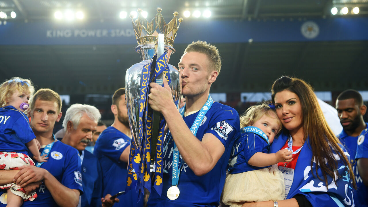 LEICESTER, ENGLAND - MAY 07: Jamie Vardy of Leicester City kisses the Premier League Trophy after the Barclays Premier League match between Leicester City and Everton at The King Power Stadium on May 7, 2016 in Leicester, United Kingdom.