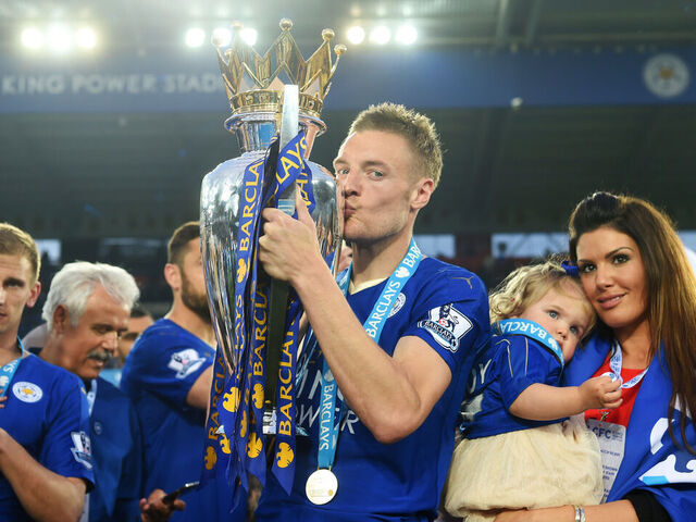 LEICESTER, ENGLAND - MAY 07: Jamie Vardy of Leicester City kisses the Premier League Trophy after the Barclays Premier League match between Leicester City and Everton at The King Power Stadium on May 7, 2016 in Leicester, United Kingdom.
