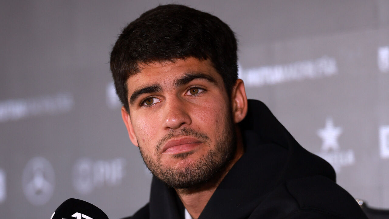 MADRID, SPAIN - APRIL 24: Carlos Alcaraz of Spain speaks to the media in a press conference after the announcement of his withdrawal from the tournament due to injury during Day Three of the Mutua Madrid Open at La Caja Magica on April 24, 2025 in Madrid, Spain.