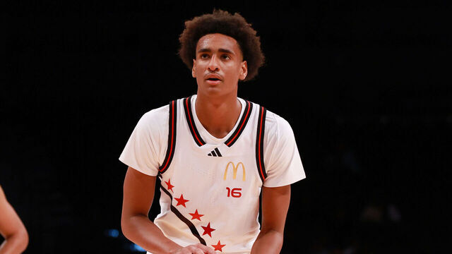 BROOKLYN, NY - APRIL 01: McDonalds High School All American Alijah Arenas (16) shoots a free throw against Darius Adams (20) during the McDonalds Boys High School All American Game on April 1, 2025, at the Barclays Center in Brooklyn, New York.