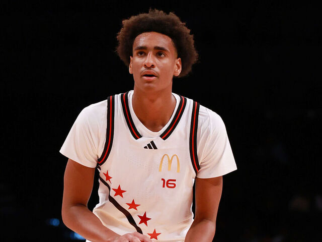 BROOKLYN, NY - APRIL 01: McDonalds High School All American Alijah Arenas (16) shoots a free throw against Darius Adams (20) during the McDonalds Boys High School All American Game on April 1, 2025, at the Barclays Center in Brooklyn, New York.