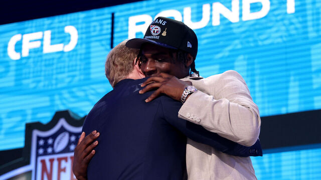 GREEN BAY, WISCONSIN - APRIL 24: Quarterback Cam Ward of Miami celebrates with NFL Commissioner Roger Goodell after being selected first overall pick by the Tennessee Titans during the first round of the 2025 NFL Draft at Lambeau Field on April 24, 2025 in Green Bay, Wisconsin.