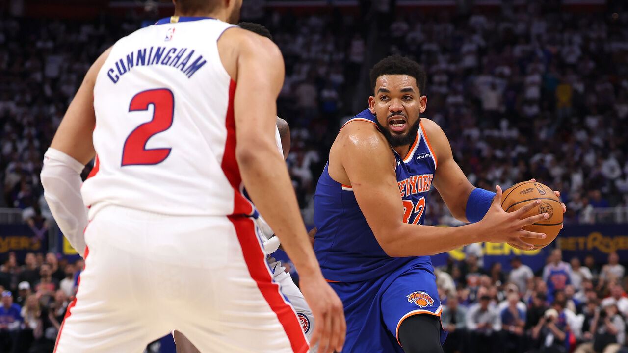 DETROIT, MICHIGAN - APRIL 24: Karl-Anthony Towns #32 of the New York Knicks drives the ball against Cade Cunningham #2 of the Detroit Pistons during the third quarter in Game Three of the Eastern Conference First Round NBA Playoffs at Little Caesars Arena on April 24, 2025 in Detroit, Michigan.