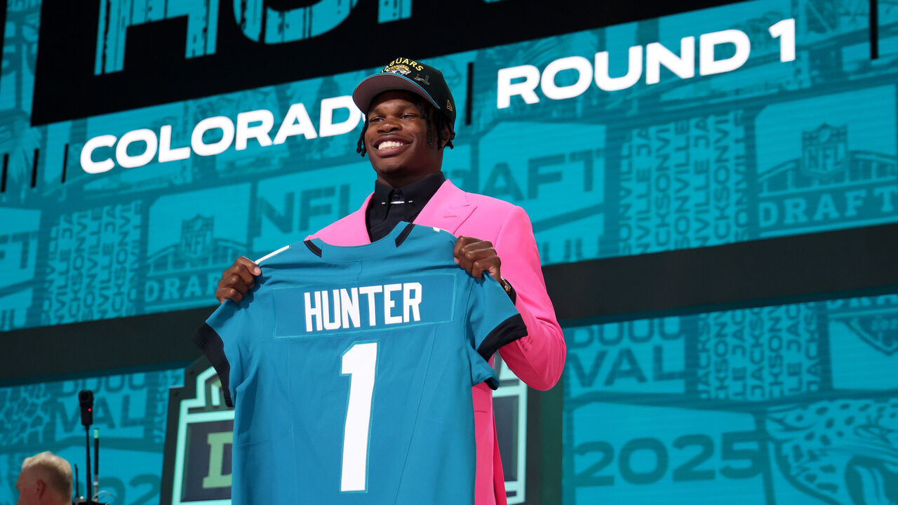 GREEN BAY, WISCONSIN - APRIL 24: Wide Receiver/Cornerback Travis Hunter of Colorado celebrates after being selected second overall pick by the Jacksonville Jaguars during the first round of the 2025 NFL Draft at Lambeau Field on April 24, 2025 in Green Bay, Wisconsin.